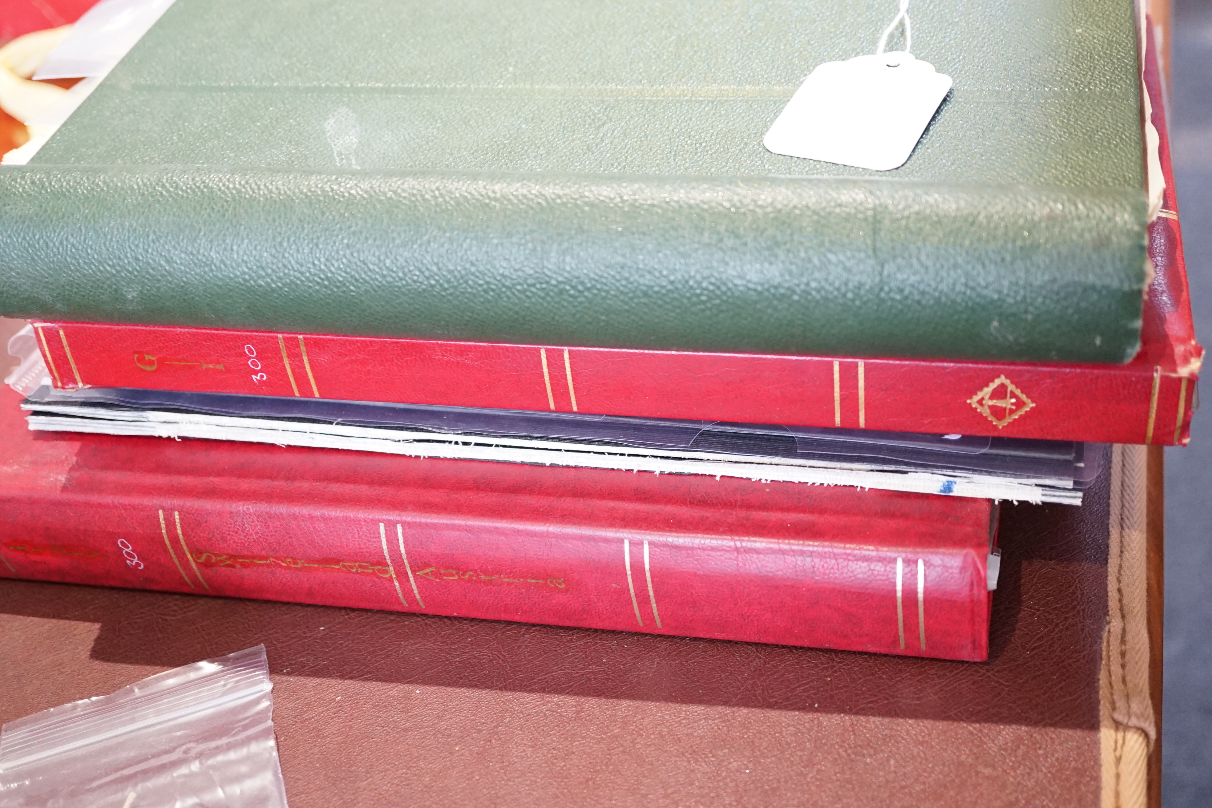 Three albums of Indian and Chinese stamps